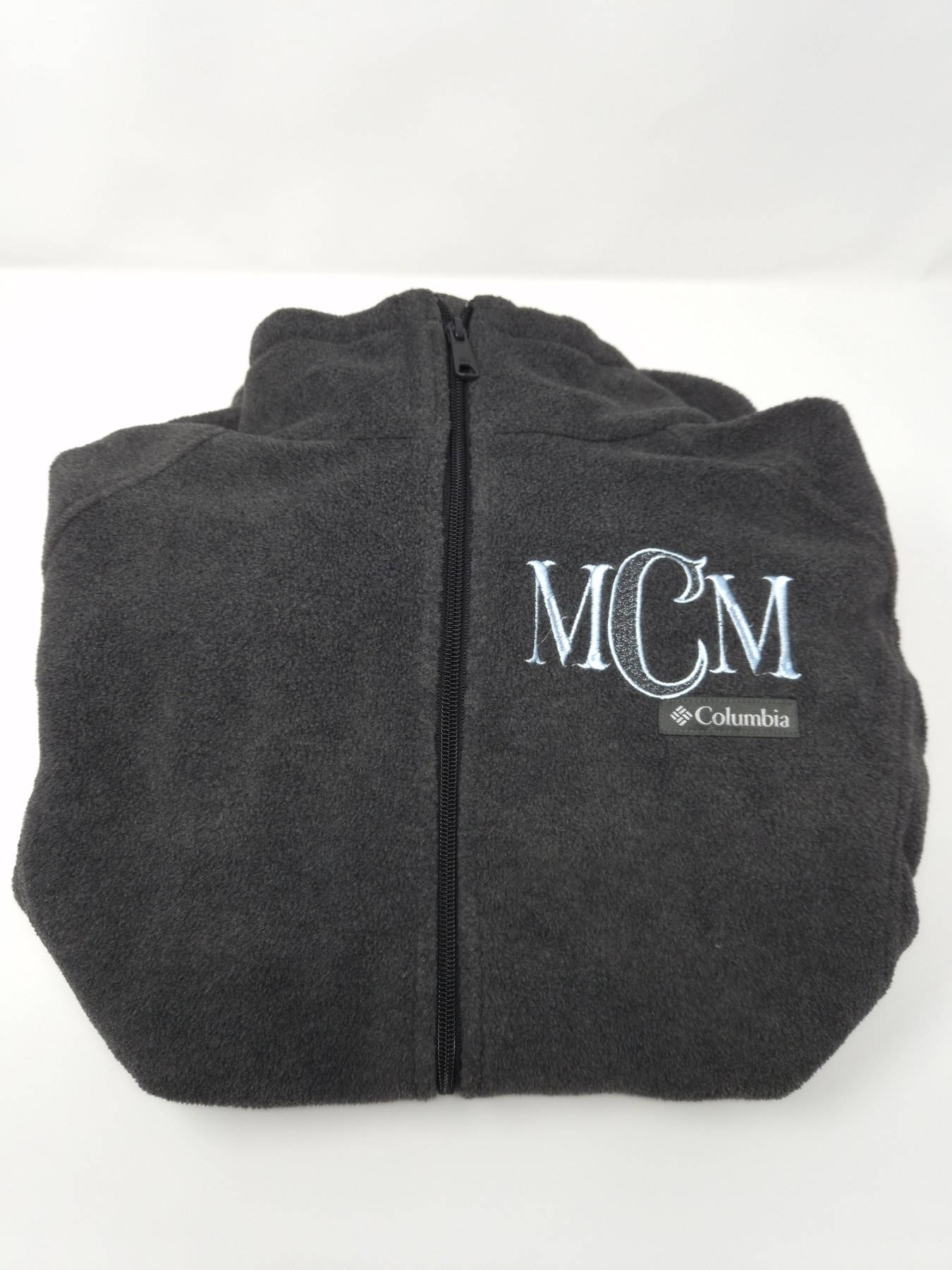 Dark zip-up embroidered with MCM monogram